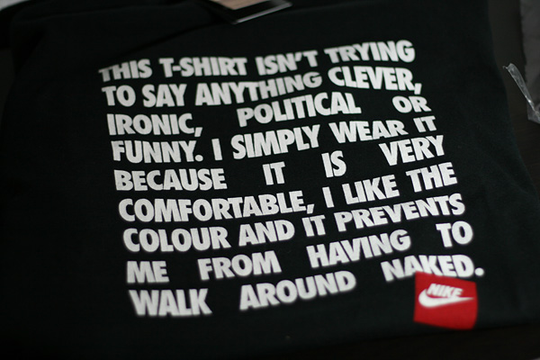 THIS T-SHIRT ISN'T TRYING TO SAY ANYTHING CLEVER, IRONIC, POLITICAL OR FUNNY. I SIMPLY WEAR IT BECAUSE IT IS VERY COMFORTABLE, I LIKE THE COLOR AND IT PREVENTS ME FROM HAVING TO WALK AROUND NAKED